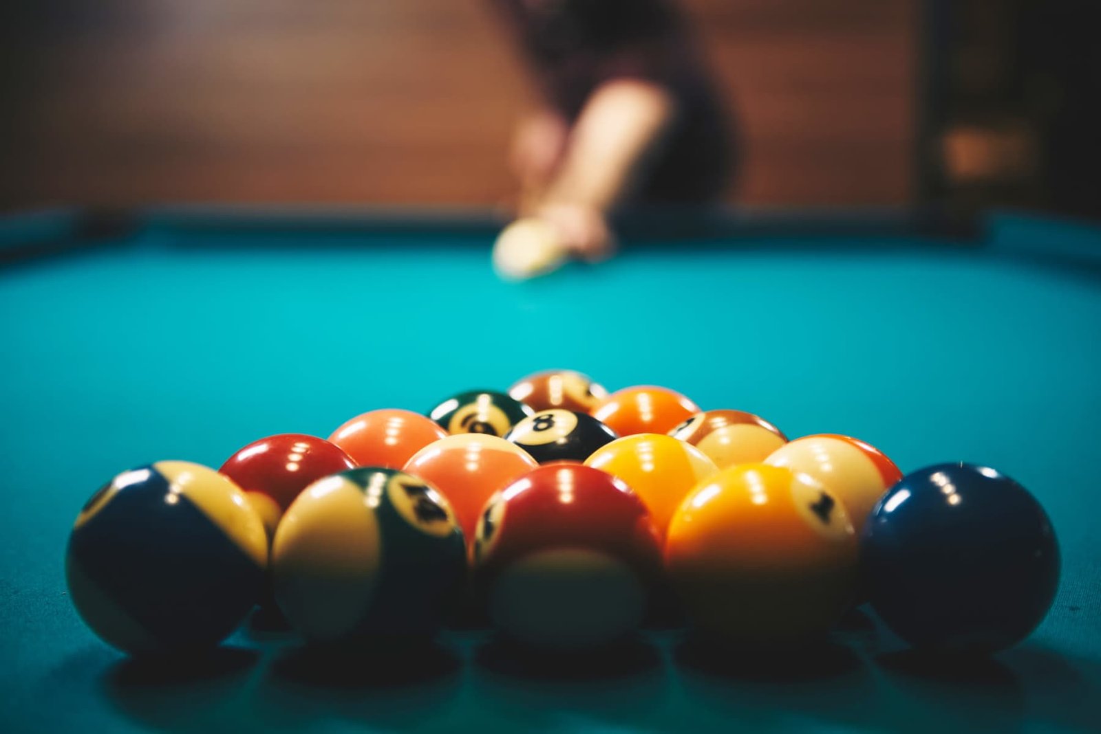 Close-up of billiard balls being racked on a table