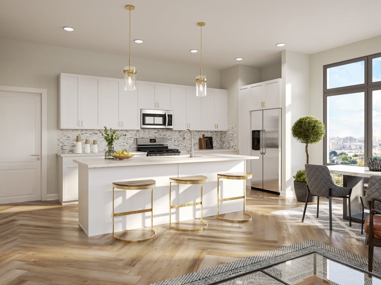 Apartment kitchen with white cabinetry, gold pendant lighting, and stainless-steel appliances